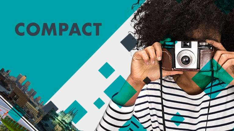Compact Logo with a woman holding a camera and taking a photo