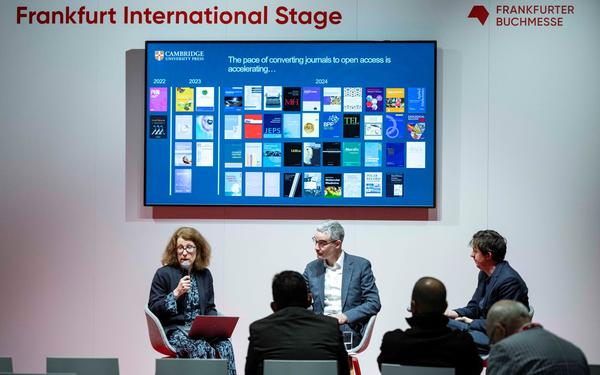 three cambridge colleagues on stage during panel at Frankfurt Book Fair 2023