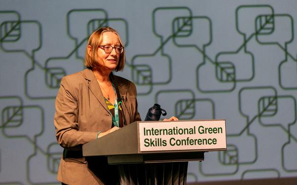 Christine Ozden speaking at the International Green Skills Conference 2023
