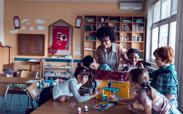 Young students in art class with teacher