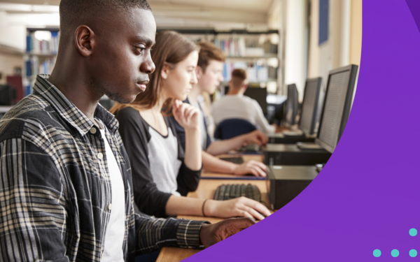 Students looking at computers