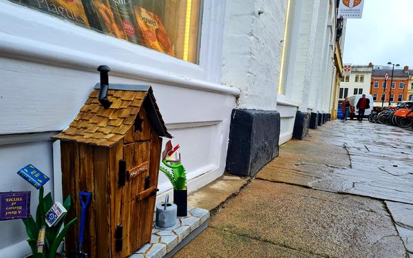 A 'Dinky Door' miniature sculpture outside Cambridge University Press Bookshop
