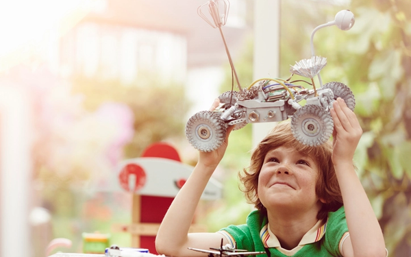 Boy with mechanical car