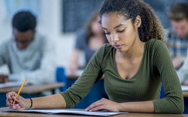 Students taking an exam in a classroom