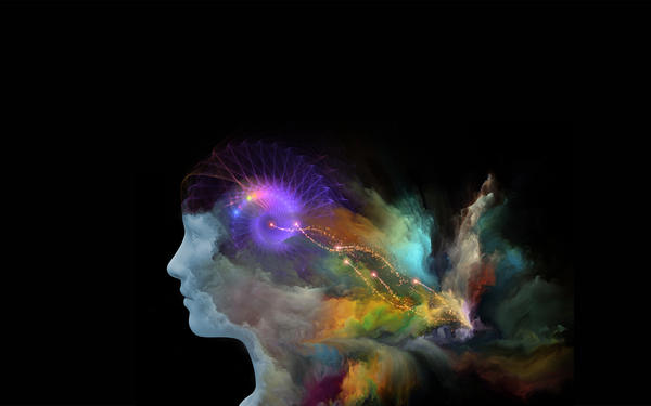 abstract image of face with different color variation on black background
