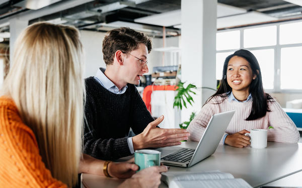 three young colleagues working together