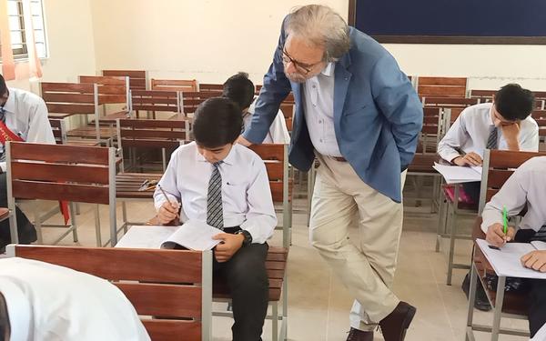 Children sit test in Pakistan classroom