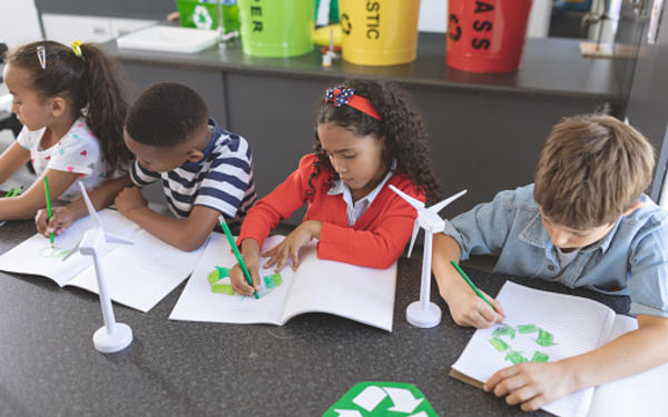 School students learning about recycling 