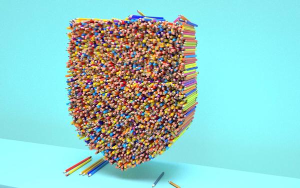 Mulitcoloured pencils creating shield shape.