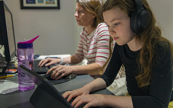 Young girl working on ipad
