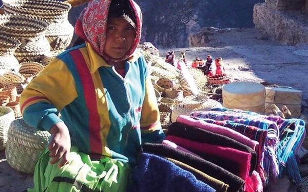 Woman selling blankets
