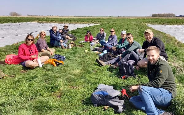 Cambridge colleagues in the UK take part in moss planting project