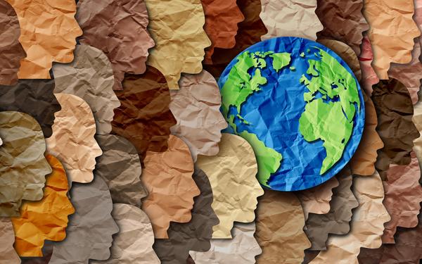 paper faces and a paper globe