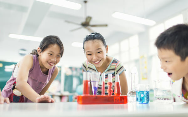 students doing a science experiment