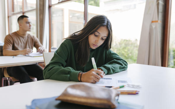 teenage student concentrating during a test