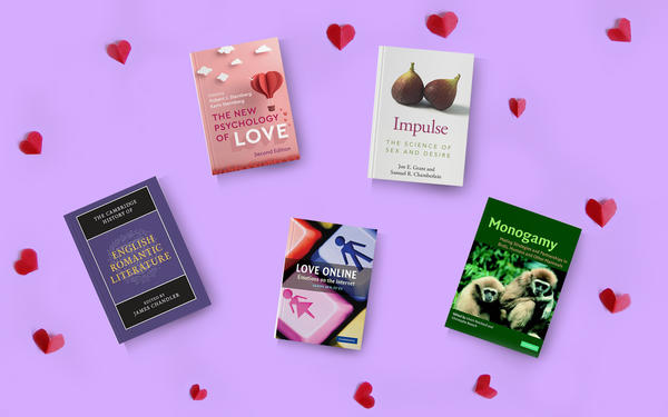books on purple background with hearts