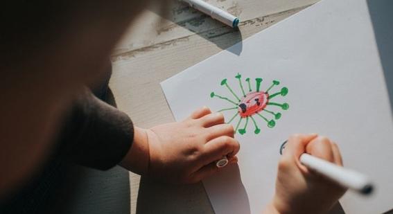 Child drawing covid virus