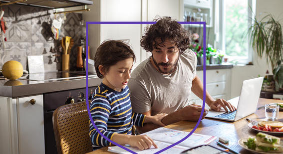 Parent teaching child at home 