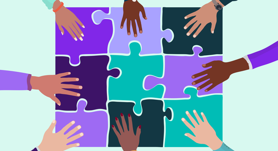hands holding pieces of a jigsaw to demonstrate building a sense of belonging