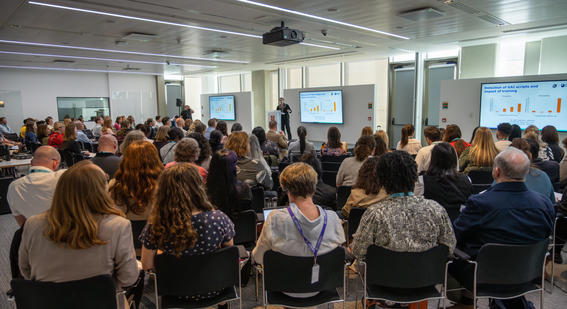 rows of seated delegates at the assessment network conference 