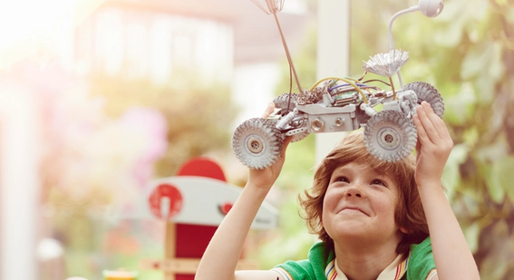 Boy with mechanical car