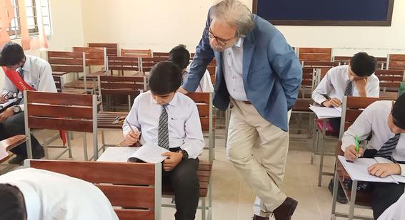 Children sit test in Pakistan classroom