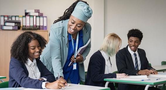 Image of children and a teacher in a classroom