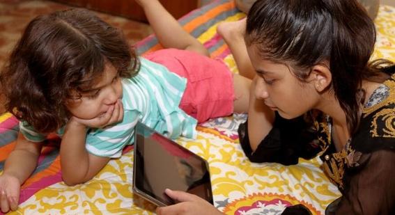 Children looking at tablet