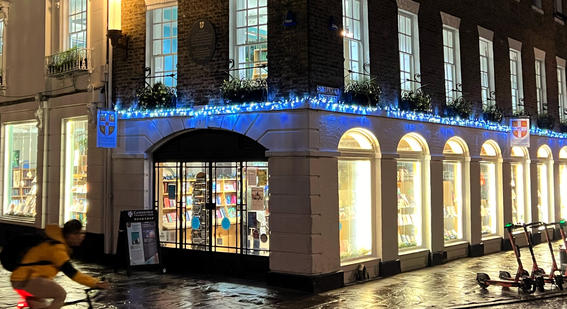 Cambridge University Press Bookshop front in the evening 