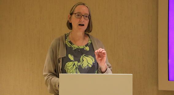 Christine Ozden speaking at COP28