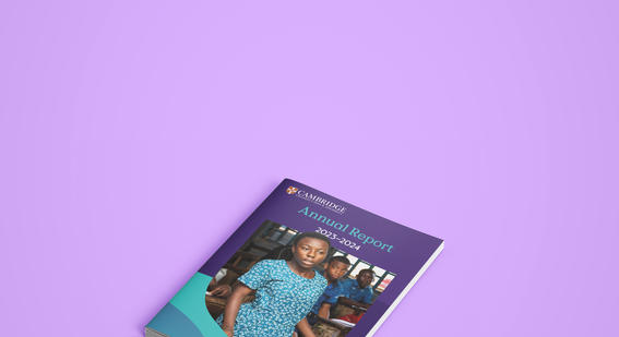 A stack of Cambridge Annual Reports on a purple background.