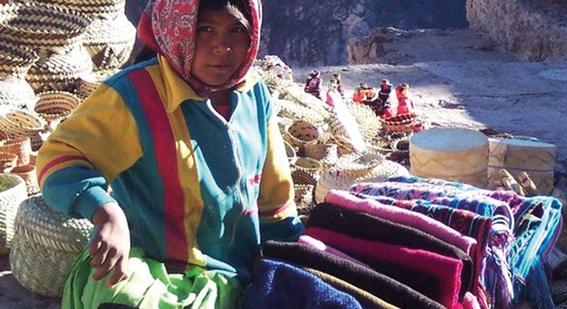 Woman selling blankets