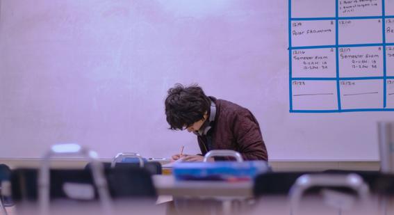 student working at desk