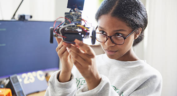 girl looking at robot